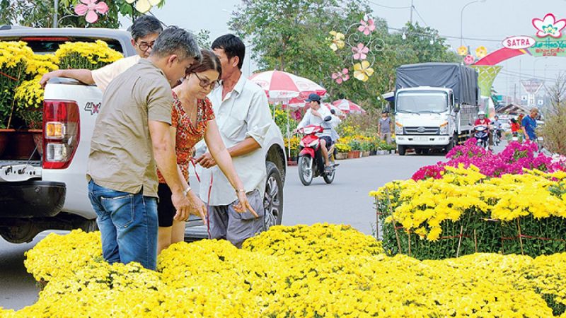 Bài văn tả cảnh chợ hoa ngày tết quê em số 7