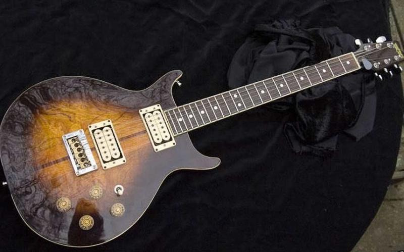 Bob Marley’s Custom made Washburn 22 series Hawk