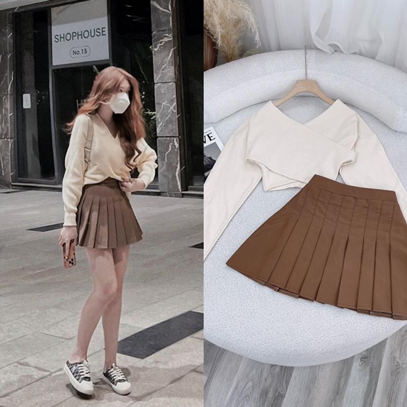 Phối áo len croptop cùng chân váy xòe