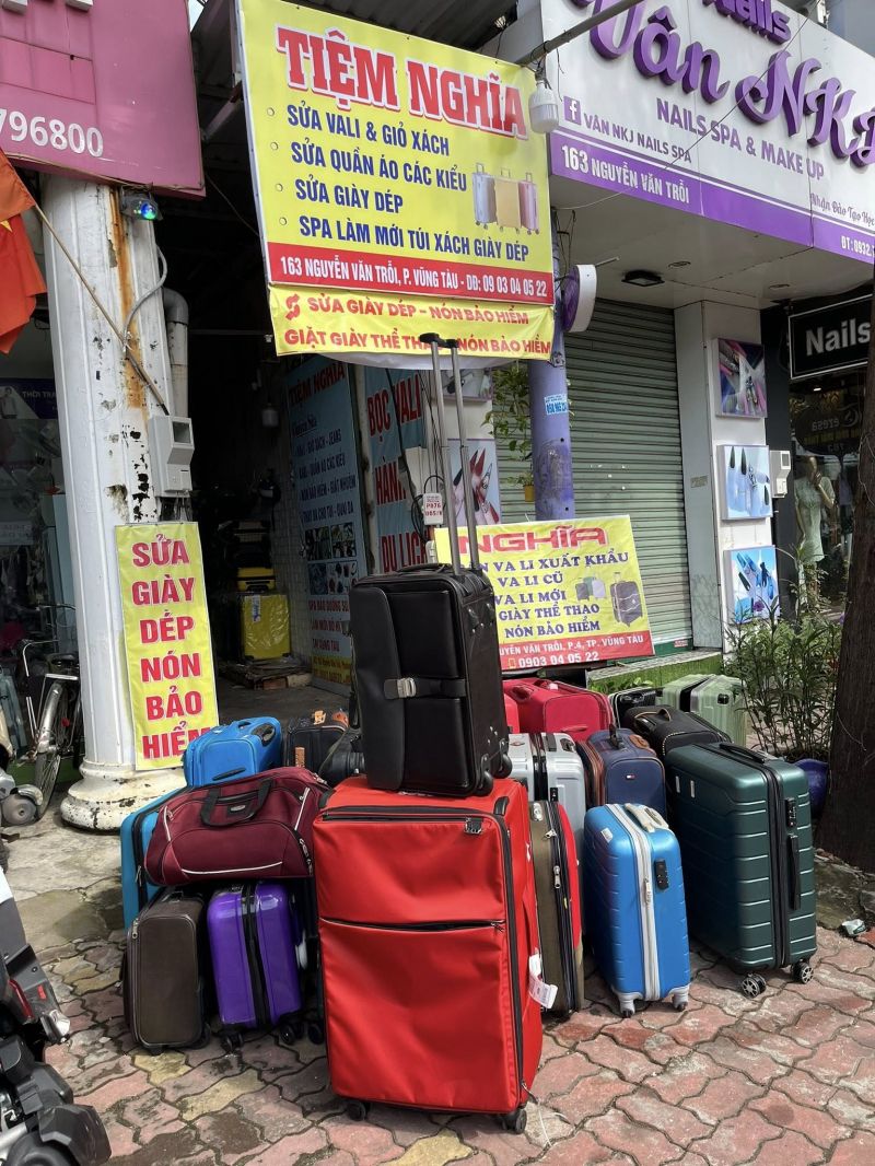 Tiệm sửa quần áo Nghĩa